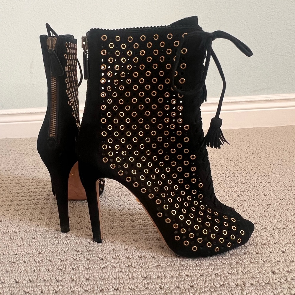 Prada Black Heels with Gold Logo Accent